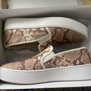 Michael Kors Teddy slip on heavy canvas shoes.